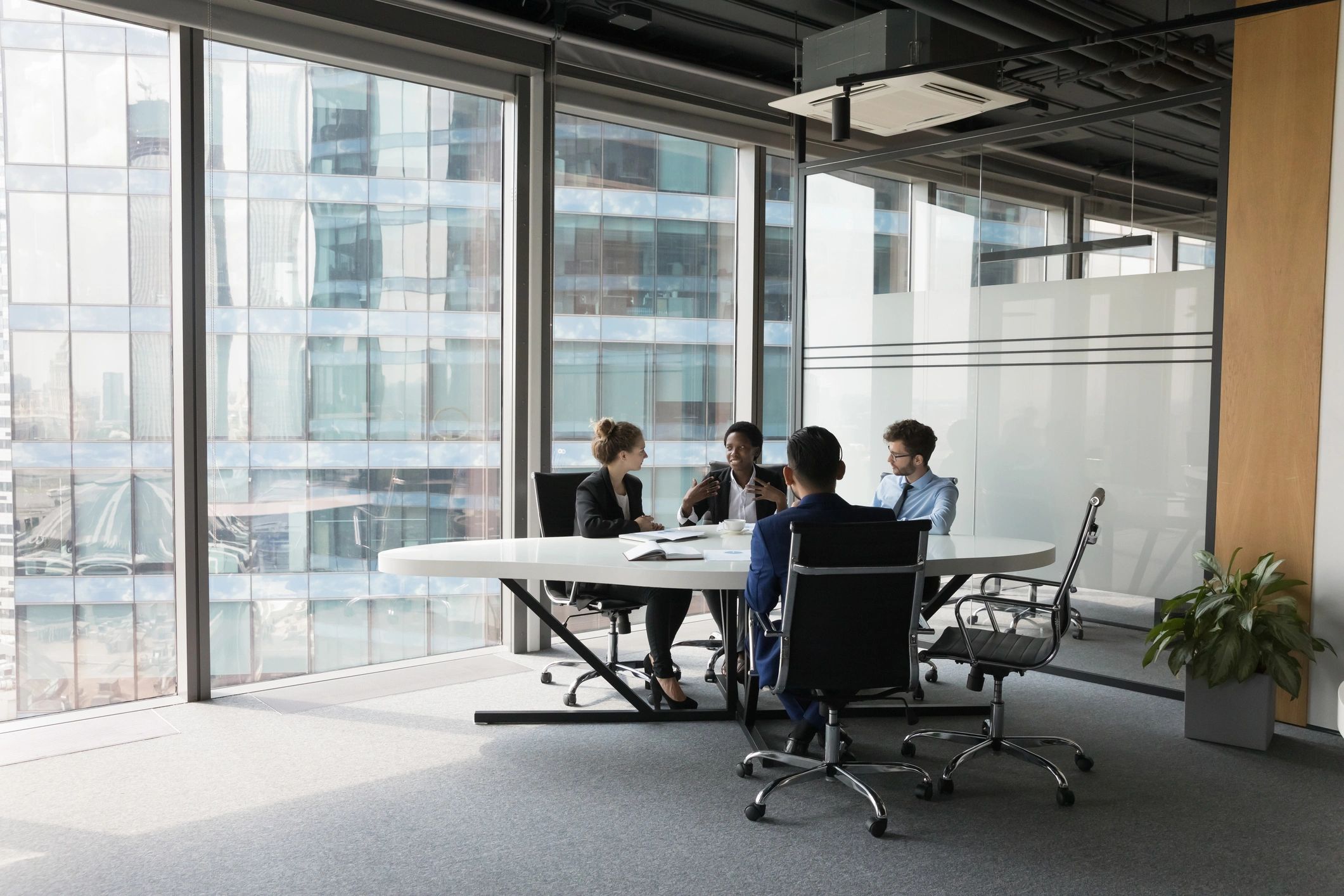 Technical advisor in a collaborative office meeting