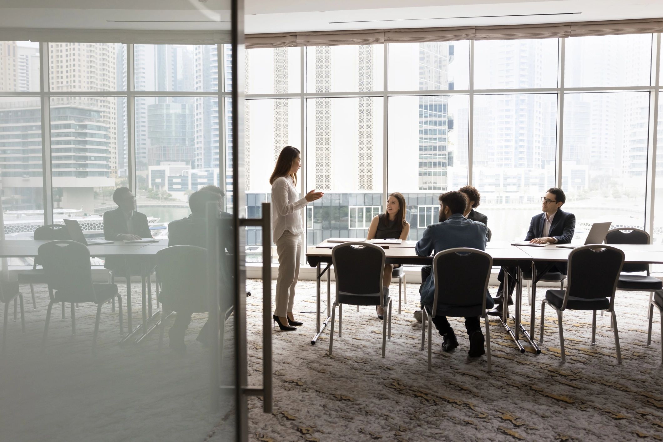 Technology consulting team collaborating in a conference room