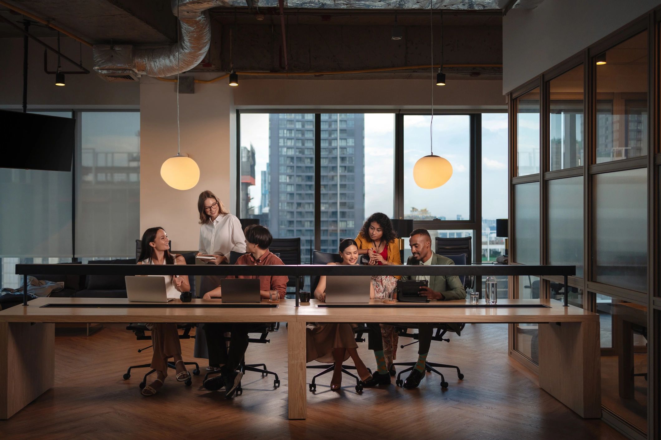 Consulting team collaborating in a modern workspace